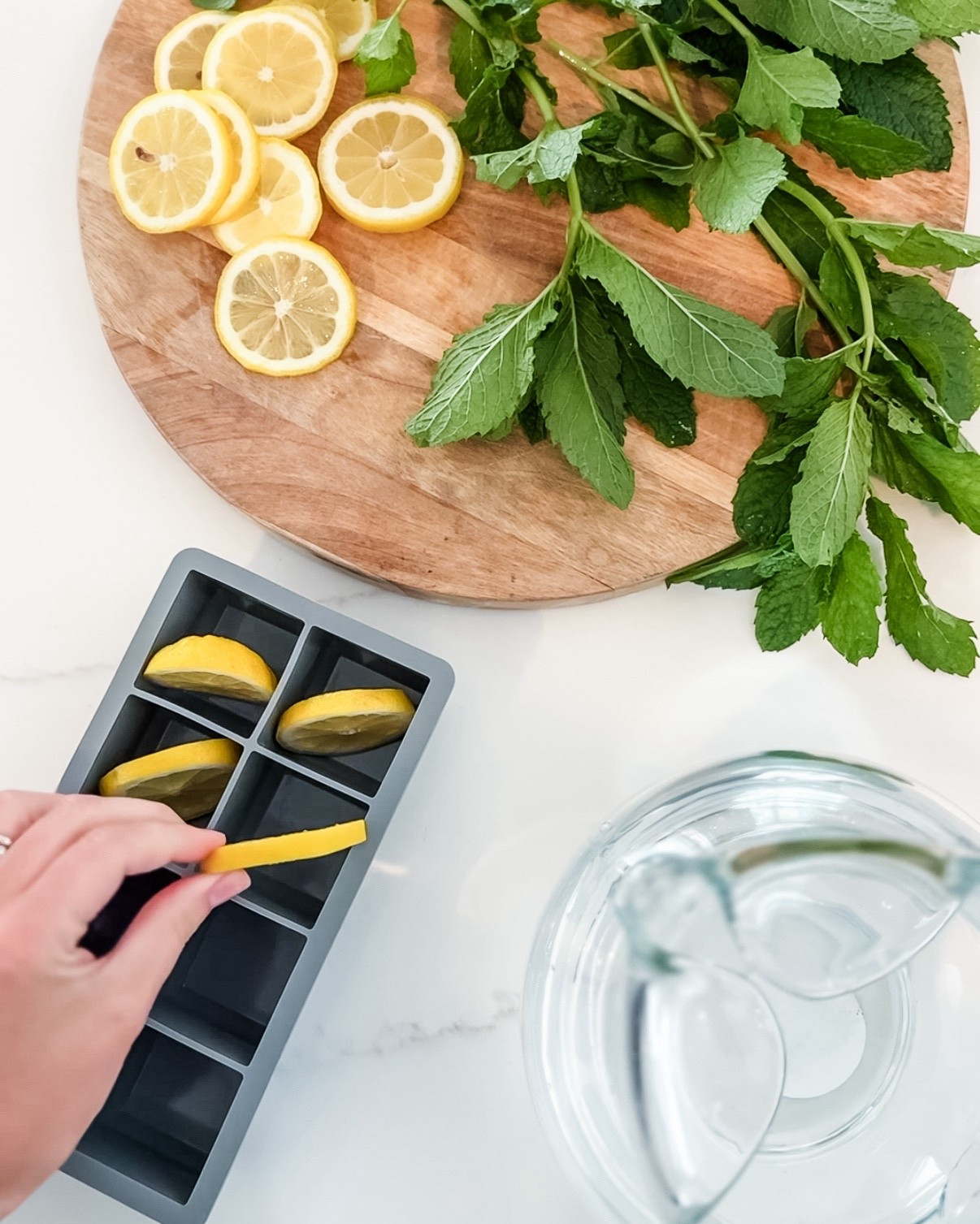 This ice cube tray is perfect for spicing up all of your favorite drinks. It's something that everyone should have in their kitchen! I love adding mint and lemon to my ice cubes. It’s so yummy with sparkling soda on top.

ice cube tray, silicone ice cube tray, kitchen must have, Amazon kitchen find, found it on Amazon, Amazon home essentials, drink ice cube tray, cocktail ice tray, infused ice cube tray, herb ice cube tray, fruit infused ice tray, flavored ice cubes, ice tray for drinks, ice cube mold, easy release ice tray, large ice cube tray, small ice cube tray, ice tray with lid, freezer ice tray, kitchen gadget Amazon, everyday kitchen tool, non stick ice cube tray, reusable ice cube tray, ice cube tray for sparkling drinks, drink accessory Amazon, drink garnish ideas, drink upgrade tool, ice tray for mint cubes, lemon ice cubes, entertaining must have, kitchen organization find, ice cube tray with compartments, drink prep tool, functional kitchen gadget, modern kitchen find, bar cart essential, drink station essential, easy ice tray, DIY flavored ice cubes, beverage accessory, summer drink must have, sparkling soda accessory, drink enhancer tray, fun kitchen find

#LTKHome #LTKParties #LTKSeasonal