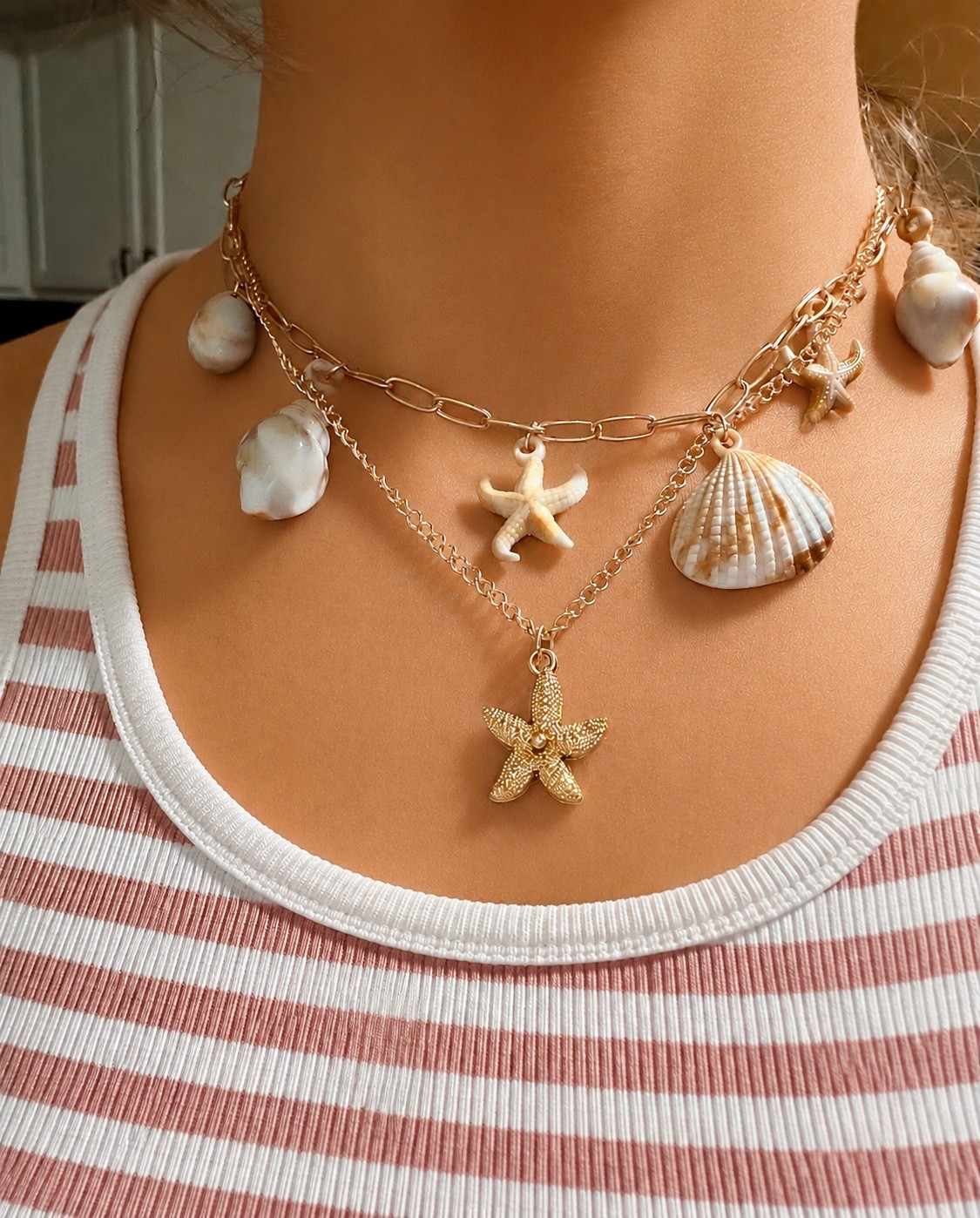 Beachy layers + striped tanks just hit different this time of year 🌊⭐️ Shell charms, sunkissed vibes, and the easiest summer look to throw on. Linked everything for my coastal girlies 🤍

#SummerStyle #BeachyVibes #CoastalStyle #StripedTank #ShellJewelry #LayeredNecklaces #AmazonFinds #SummerOutfit #OOTD #CasualStyle #VacationStyle #TrendyAccessories #CoastalGranddaughter #EverydayStyle #FashionInspo #SummerFashion #AmazonInfluencer #GoldJewelry #EasyOutfit #MomStyle