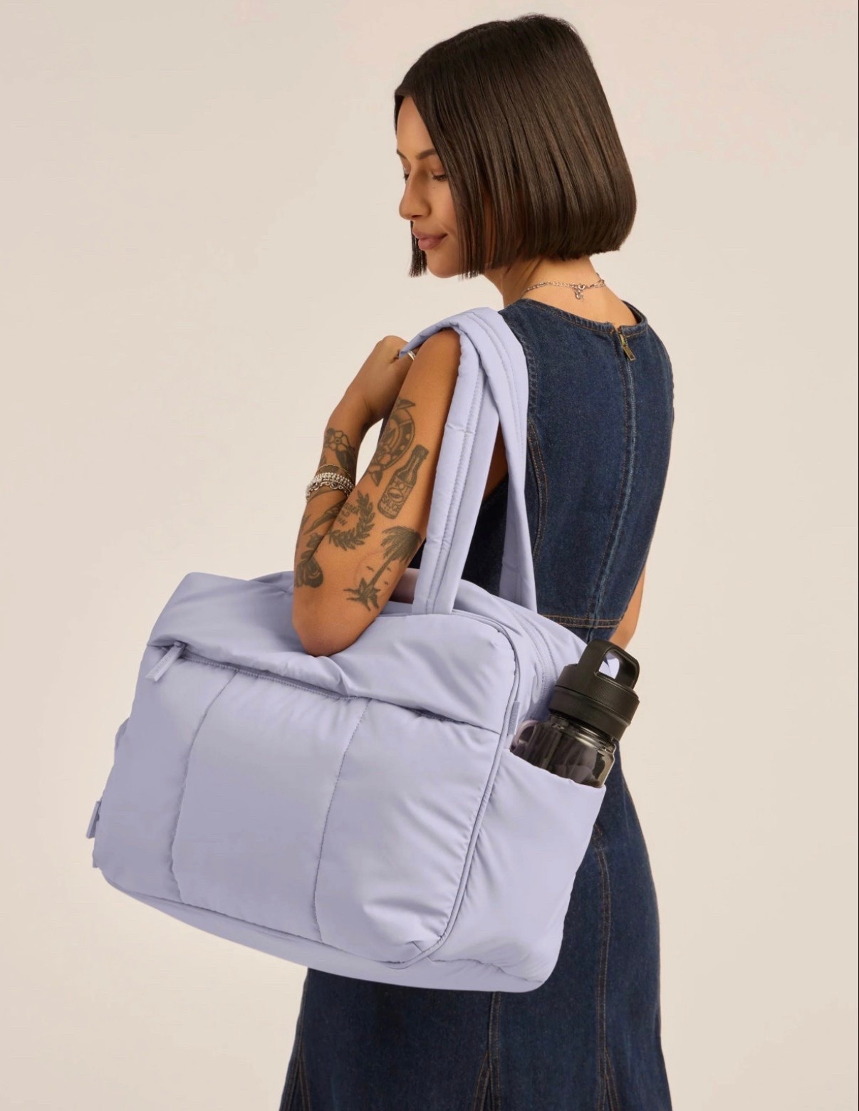 The CALPAK Luka Duffel is one of my most-used bags 🤍 It comes in so many cute colors and is so functional — with 9 pockets for easy organization, a spacious main compartment, and a separate shoe section (game changer). Lightweight, durable, and fits perfectly under airplane seats, making it ideal for gym days, weekend trips, and travel. I love the adjustable strap and luggage sleeve for on-the-go ease ✨ 

 #LTKfitnessgoals #LTKActive #LTKTravel