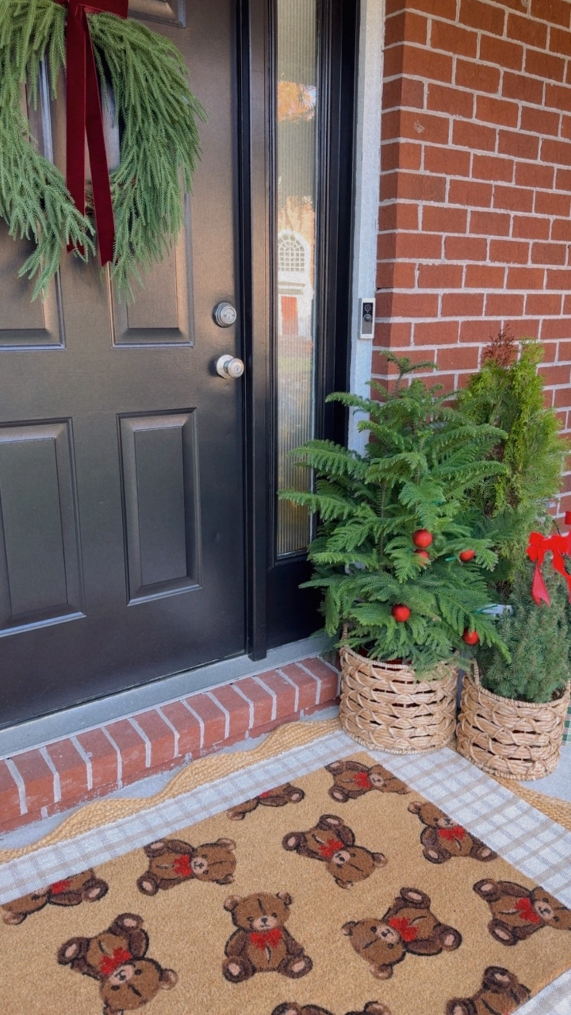 🤎✨ Feeling festive✨🤎

Details: The wreath, teddy bear doormat, and all layering rugs are from Walmart. All of these super cute live mini Christmas trees are from Lowe’s (and they include the decorative planters, bows, ornaments). These baskets I found at Homegoods earlier this year. They almost always have similar ones!

#walmartfinds #lowesfinds #holidayfrontporch #christmas #ralphlaurenchristmas 

#LTKHome #LTKHoliday