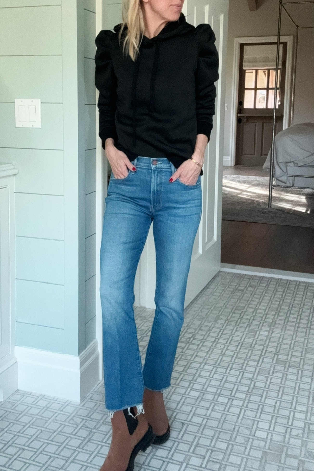 Outfit of the day: just got this black puff-sleeve hoodie from Amazon — dupe for Rebecca Minkoff. So cute. And these new mother jeans, which have the perfect pleat and no rips! Both tts. 

#LTKstyletip #LTKsalealert #LTKover40