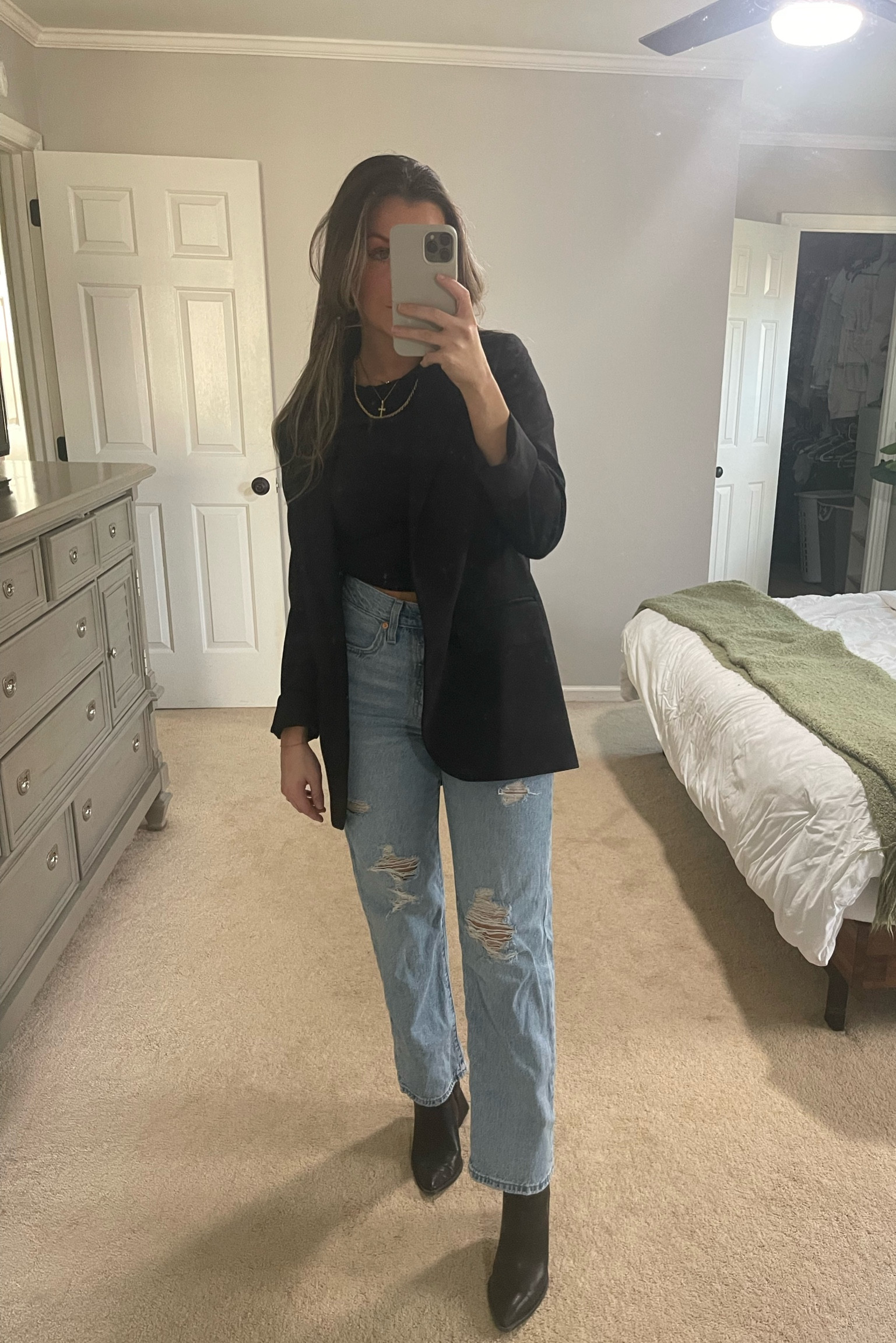 Easy everyday outfit that can transition from work to going out! 
Perfect black tee
Levi jeans 
Booties 
Blazer 

#LTKfit #LTKSeasonal #LTKworkwear