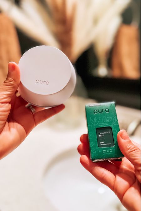 Powder Room Game Changer✨🫶🏻

I’m a @pura fan & have had 2 diffusers running in my home since last fall. Let me tell you I’m OBSESSED!!! My home now smells so luxe & clean!🩷🏠

So there’s a new line of #puradiffuser scents ➡️Open Air Technology that are specifically targeted🎯to eliminate bathroom & kitchen scent particles & replace them with these clean refreshing smells (don’t ask me how it works; it’s been years since high school chemistry class🧪). BUT IT DOES!

This 🌱Chamomile Mint🌱fragrance not only smells divine but it keeps those yucky bathroom odors at bay; which this girlie loves. Definitely recommend this new line if you want an easy & effective way to keep your home smelling fresh🤗

#pura #puradiffuser #pura4 #smartdiffuser #homegoals #makeyourhouseahome #purafragrance #powderroom #bathroomrefresh #homedetails #cleanscent #homedecor #diffusers #diffuser #myhomesmellsamazing #bathroomhacks #homestyling #odoreliminator #momfluencer #momlifestyle #gifted #momlifestyleblogger #momstylelife #atlantamomblogger #atlantainfluencer #loveyourhome #myneutralhome #myneutralstyle

#LTKover40 #LTKhome #LTKfindsunder50