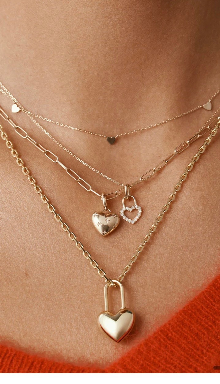 Heart Padlock Charm
Lock it up and throw away the key. We're all in on this new, gold plated heart padlock charm.

Whether you're dressing up a casual outfit or completing a more dressed up look, this heart charm effortlessly transitions from day to night. A symbol of love (in whatever form that may take), it

#LTKValentine #LTKTravel #LTKWorkwear