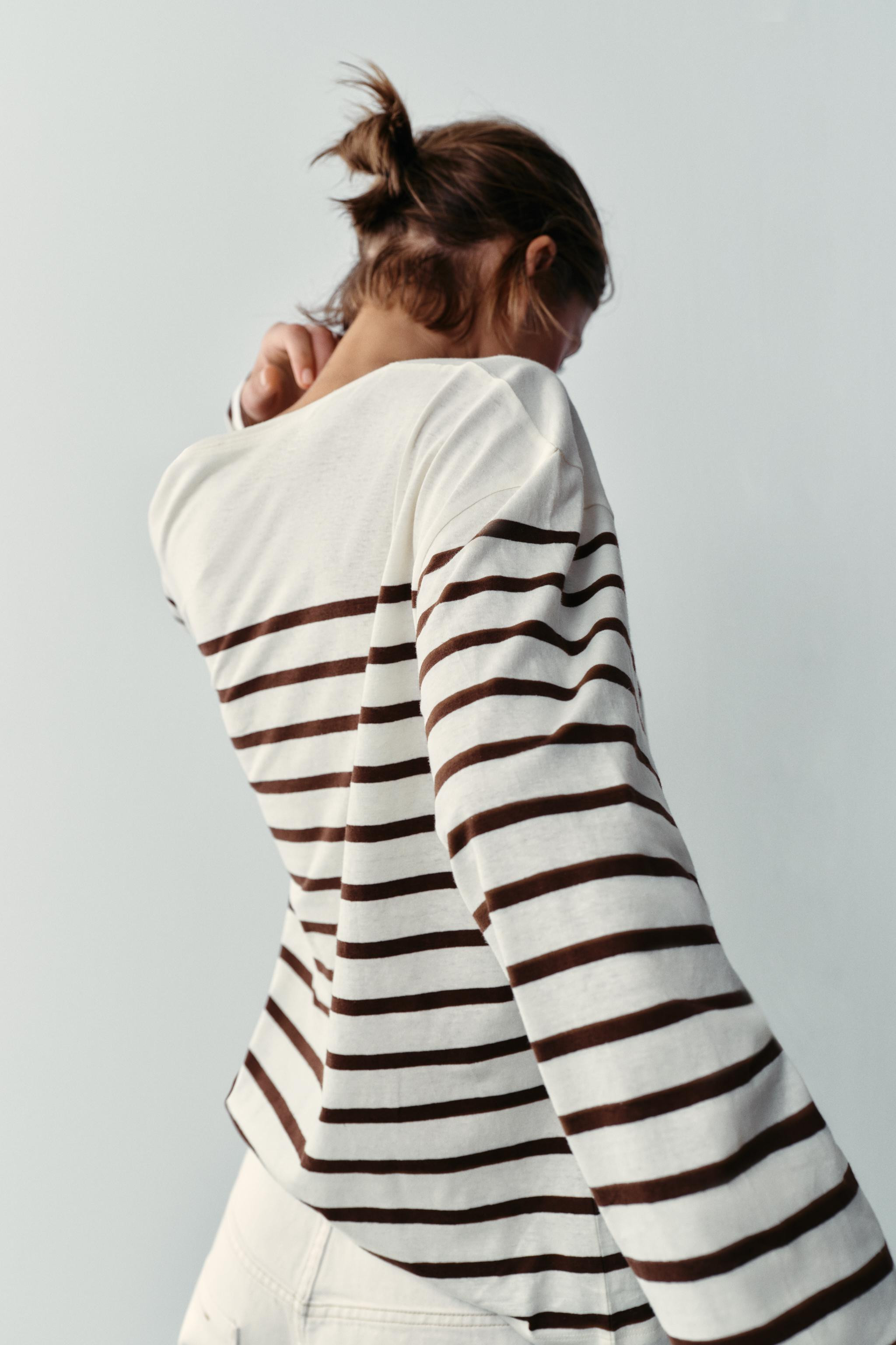 Model height: 180 cmREGULAR FIT - ROUND NECK - REGULAR LENGTH - LONG SLEEVET-shirt crafted from a... | Zara UK
