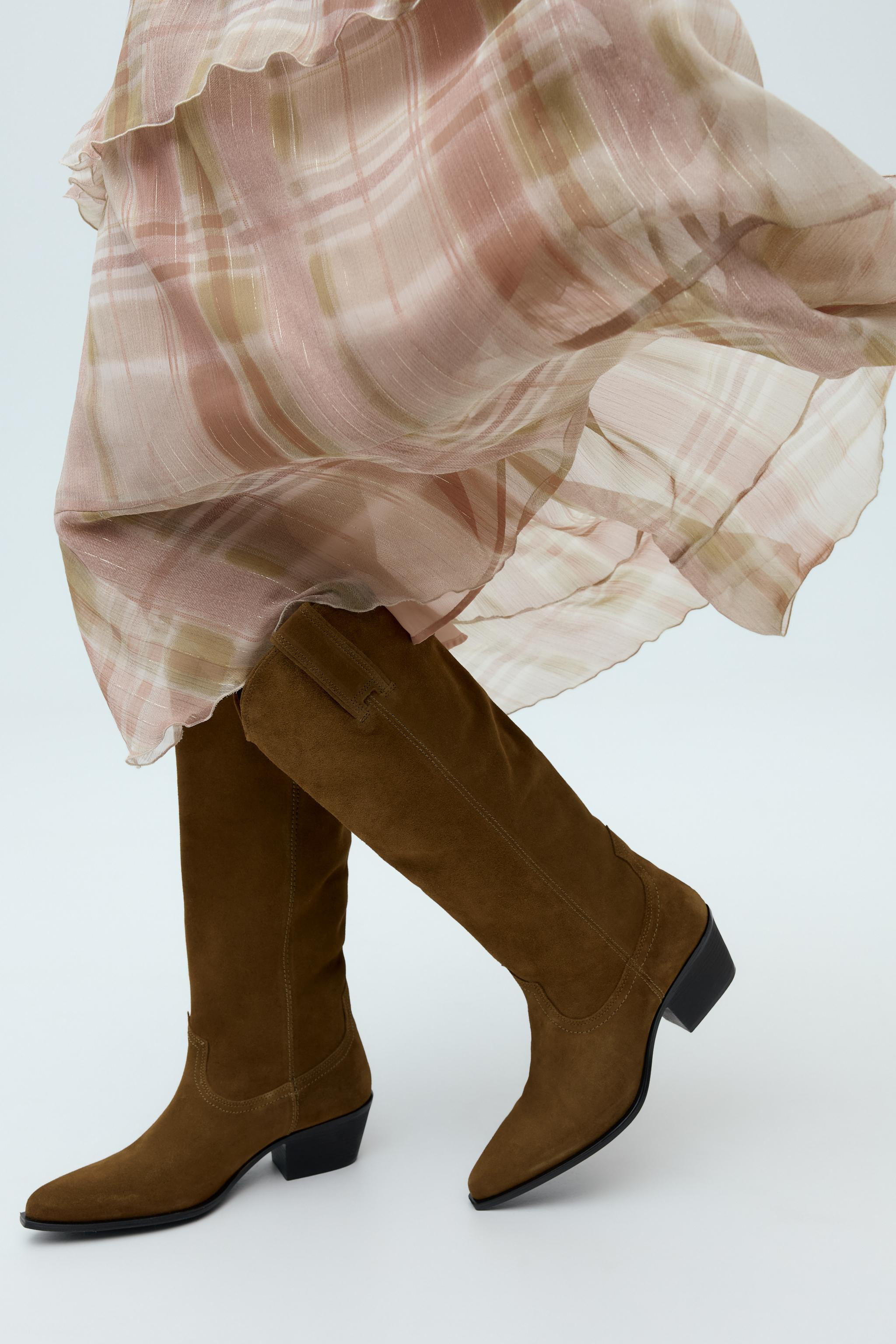 Over the knee high boots made of suede. Cowboy style. Side pull tabs. Pointed toe. Heel height: 2... | Zara US