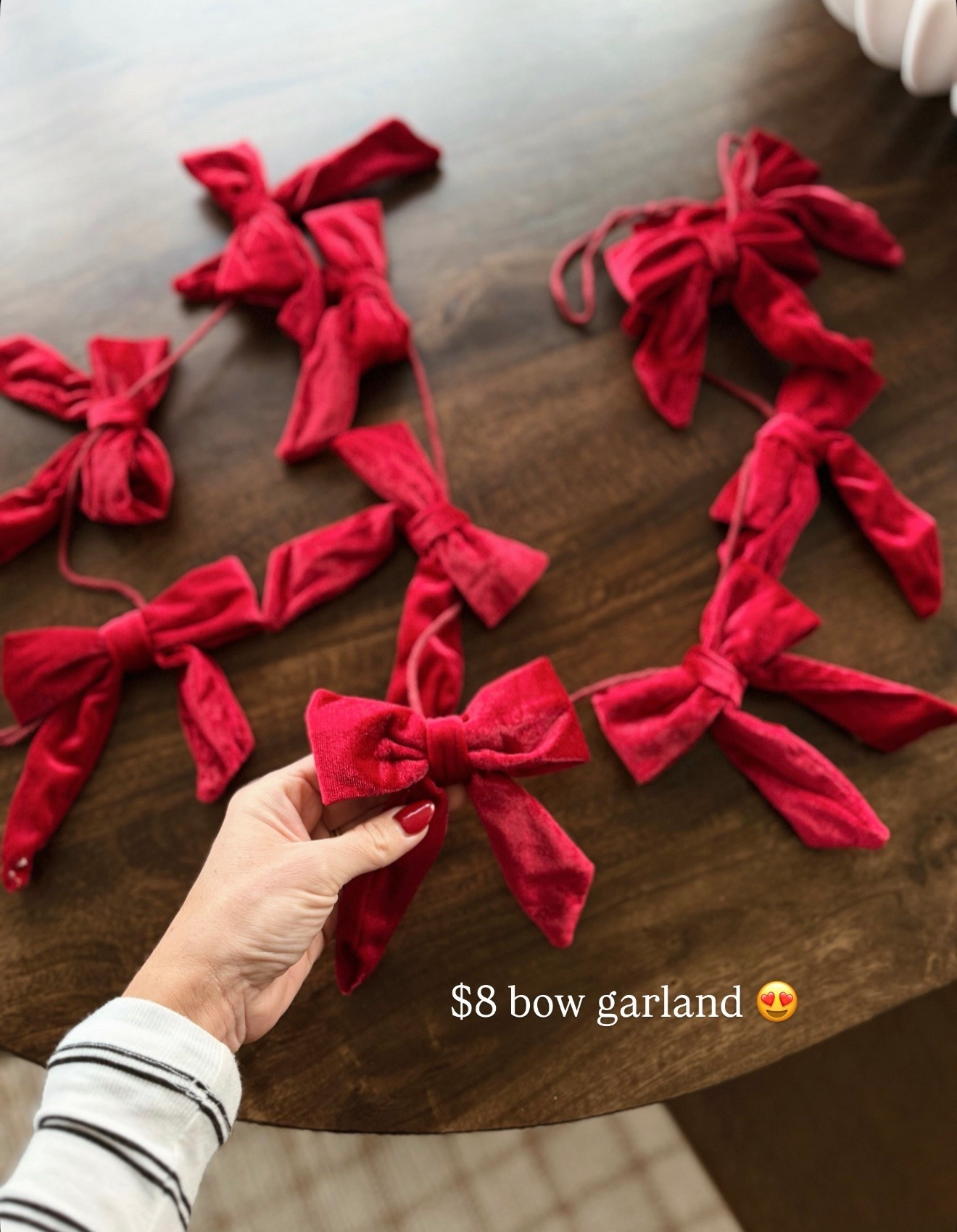 $8 bow garland! I bought two of these to hang on our mantel or stair garland  

#LTKHome #LTKHoliday #LTKFindsUnder50