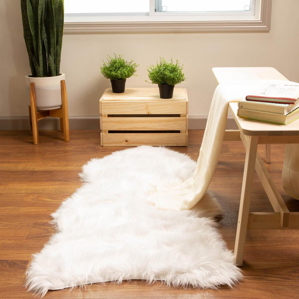Super Area Rugs Serene Silky Faux Fur Fluffy Shag Rug Snow White 2' x 4' Sheepskin | The Home Depot