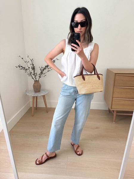 Madewell perfect vintage jeans. Run big. I cut the hems and sizes up so super oversized. Love this line too. Runs big. Size down

Madewell tank xs. exchanged for the xxs
Madewell jeans 25 
Madewell sandals 5
Madewell bag 

#LTKItBag #LTKShoeCrush