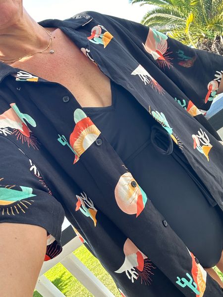 The cutest $13 over sized shirt as a beach cover up! I’m in a mediumm

#LTKOver40 #LTKStyleTip #LTKSwim