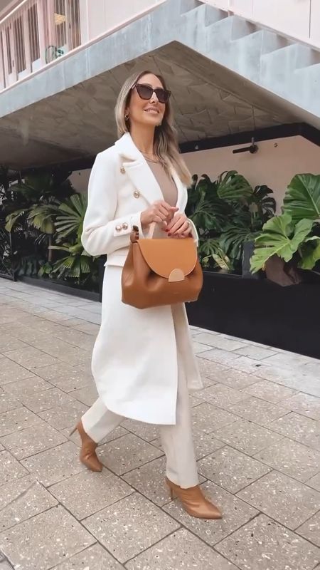 Gorgeous white trench coat! A must have staple piece in your closet
Make any outfit so elegant and chic
I’m 5’9 wearing a size small
These leather pants have an amazing quality and it fits true to size 
I’m wearing a size 2 long
Paired with the perfect camel boots
They’re comfortable and beautiful 
Fits true to size 

#LTKshoecrush #LTKitbag #LTKstyletip