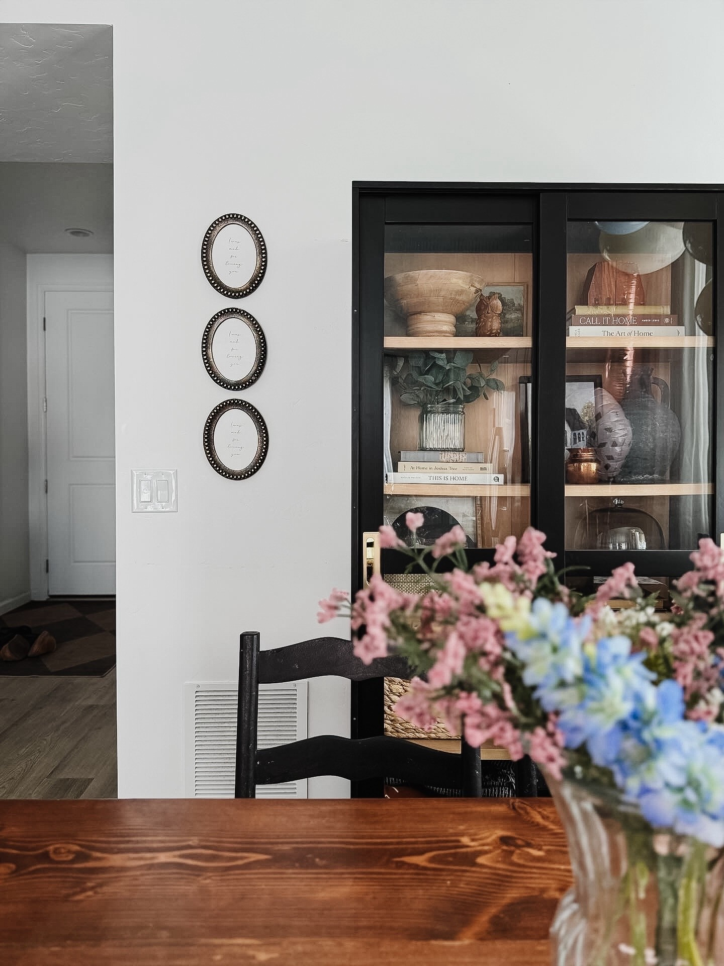 Sharing this unique little corner of our home. I’ve also found and linked similar tall cabinets in case you’re looking to add something like this to your space!

#LTKStyleTip #LTKHome #LTKOver40