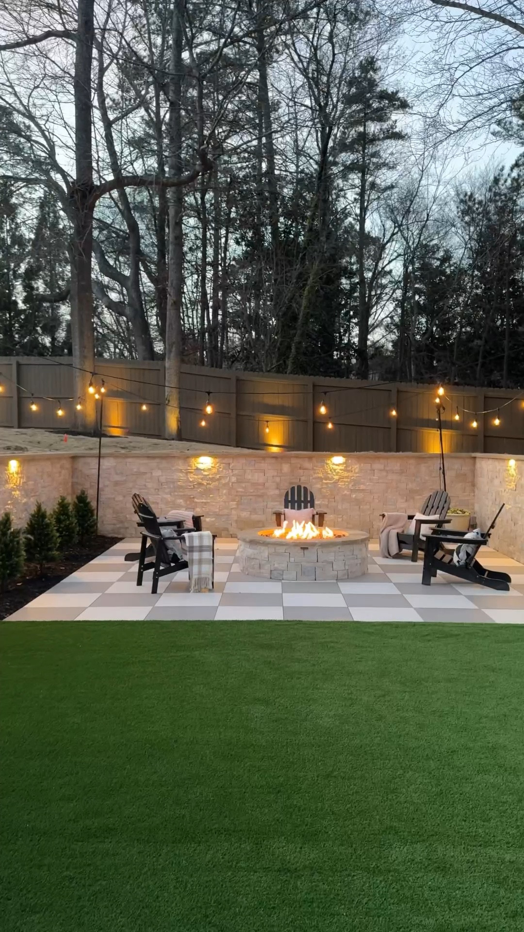 that feeling when you’re literally standing  on the space you had dreamed up when it was a pile of dirt 🥹😭 

from the checkerboard pavers, the custom gas firepit, to the limestone on the walls and on the firepit surround, I love how this space came to life in that awkward little corner 

backstory: this wasn’t originally meant to be a ‘nook’ with walls on three sides, but once we started demoing the backyard, we realized the trees we wanted to keep had roots spreading much wider than expected. 

that shifted the wall design a bit, wrapping it around the tree on the right and hence  the awkward nook situation 😅 but honestly, it ended up making the space feel even cozier, so i’m not complaining 😍


patio design, patio finds, spring patio, outdoor fire pit, backyard renovation, backyard makeover 

#LTKHome