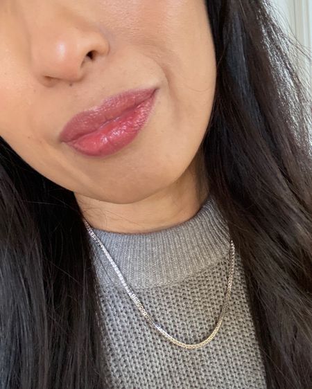 This lip stain is a great drugstore beauty product. I’m usually just a lip gloss girl, or if I do lipstick it’s my merit moisturizing one with lip gloss on top. 
This lip stain is like a combo of traditional lipgloss, butter gloss, moisturizing lipstick in one and then dries down to a lip stain. This pic is after about 4 hours. Not super pigmented which I like, but also not drying. 
This shade is rose rising. I also have mauve mentality  
Spring makeup. Beauty. 
Tennis necklace. 

#LTKfindsunder50 #LTKbeauty #LTKover40
