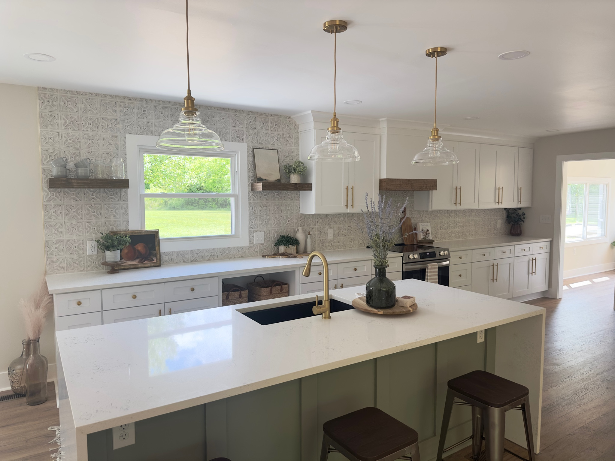 Kitchen remodel / home remodeling / new kitchen renovation/ board and batten / tile backsplash / gold light fixture / gold pulls gold cups

#LTKHome #LTKFindsUnder100 #LTKFamily