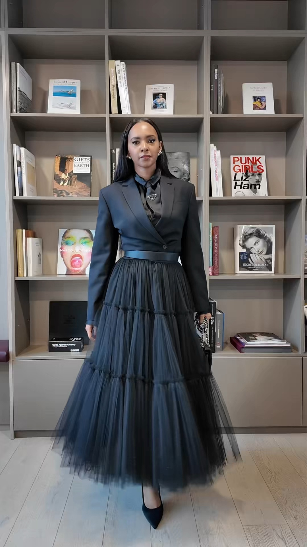 I love a good tutu skirt moment and decided to style it for work by adding a belt to create a more defined waist and a shirt and tie for a masculine look. The layers of tulle against the blazer create such beautiful dimension that proves black-on-black is anything but boring.

#LTKeurope #LTKgrwm #LTKstyletip