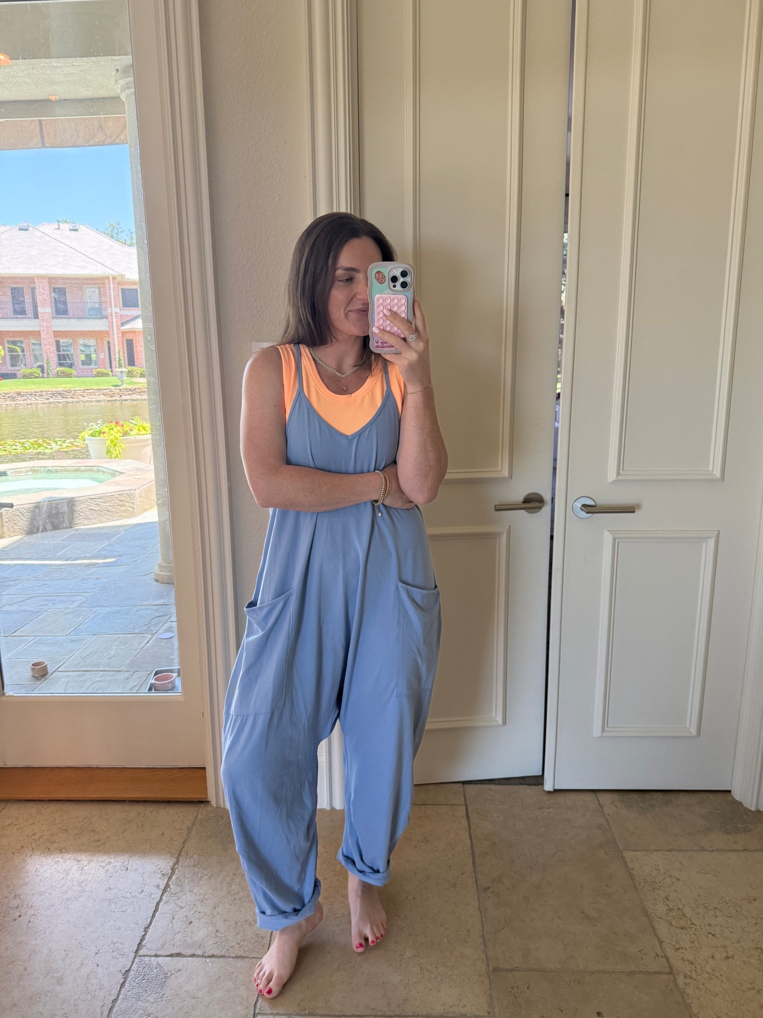 Wearing a M/L in the Muscle Tank in Neon Clementine and a Medium in the Hot Shot Onesie. They are sold out of the Hot Shot in this blueberry color but they have so many other options! 

#LTKTravel #LTKActive #LTKHome