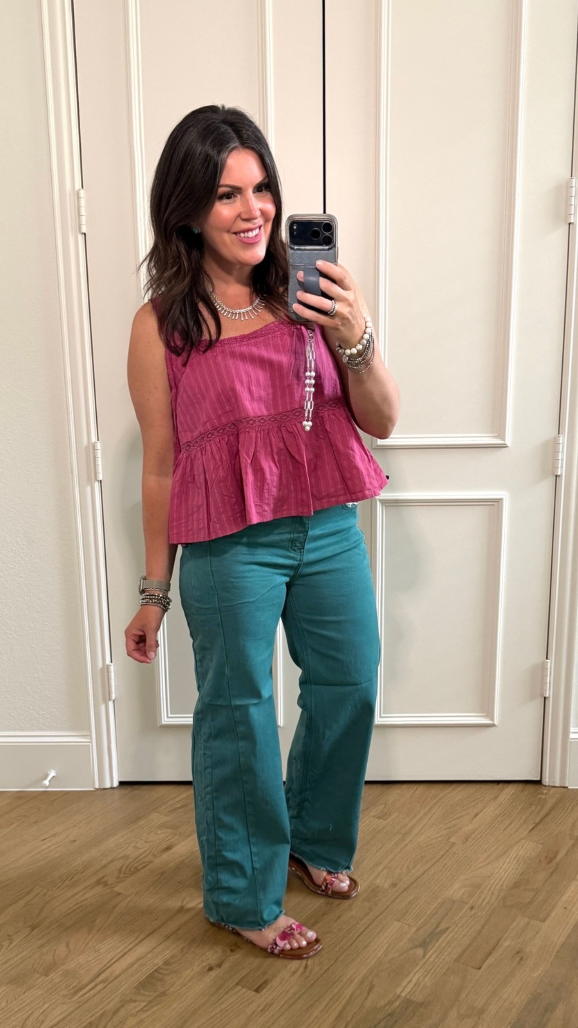 Jade high waist wide leg jeans that are fitted through the hips/thighs/butt with Cyclamen boho tank. Jeans from Amazon fit tts I’m in an 8 and at 5’5” they’re perfect with flats but too short for heels! Top from Walmart and I should have sized down to a small! Very pretty color combo together! Paired with brushed silver and turquoise jewelry and old floral sandals. I’m a natural ingenue but this look leans more ingenue natural. Fun summer mom fit. Could add a cardigan to wear in the office or swap out for sneakers for a more casual occasion.

#LTKootd #LTKmomlife #LTKOver40