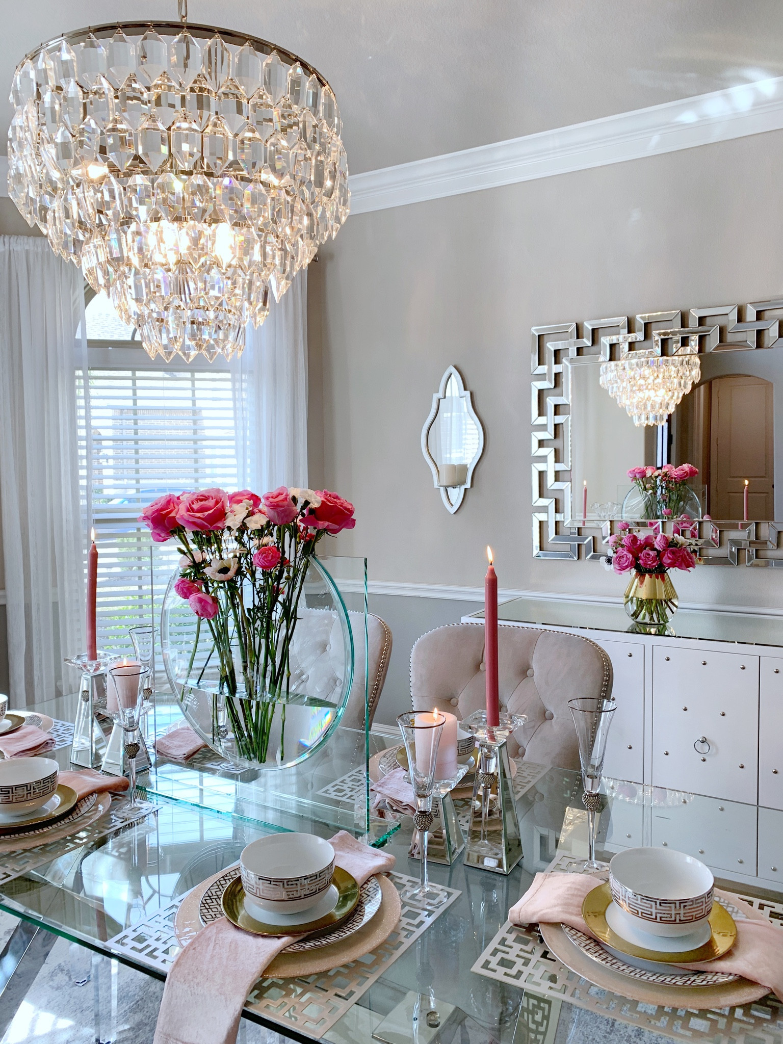 Hosting this weekend? Here’s a table setting inspo #diningroom #diningroominspo #tablescape #tablesetting #chandelier #diningtable #diningchairs #glassvases 

#LTKhome #LTKFind #LTKsalealert