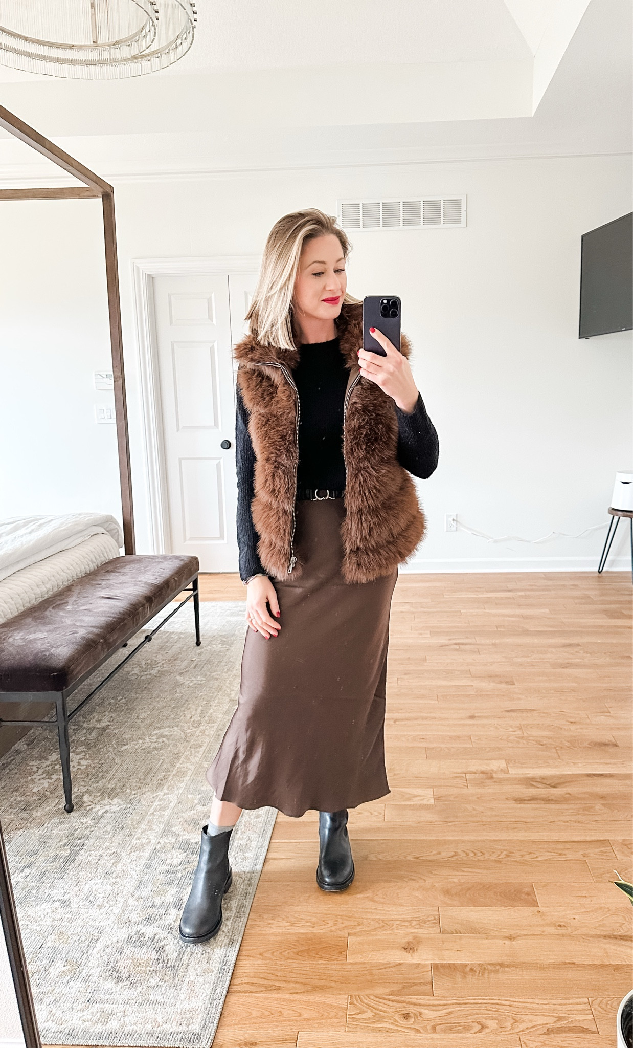 A little black and brown and drama moment for church 💃🏼💁🏼‍♀️ I needed something to spice up my wardrobe and this skirt & vest was exactly it! I can’t wait to style all sorts of ways! 

#LTKGiftGuide #LTKFindsUnder100 #LTKWorkwear