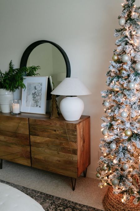 Christmas decor
Christmas tree
Table lamp
Artwork 
Dresser
West Elm


#LTKhome #LTKfindsunder100 #LTKHoliday
