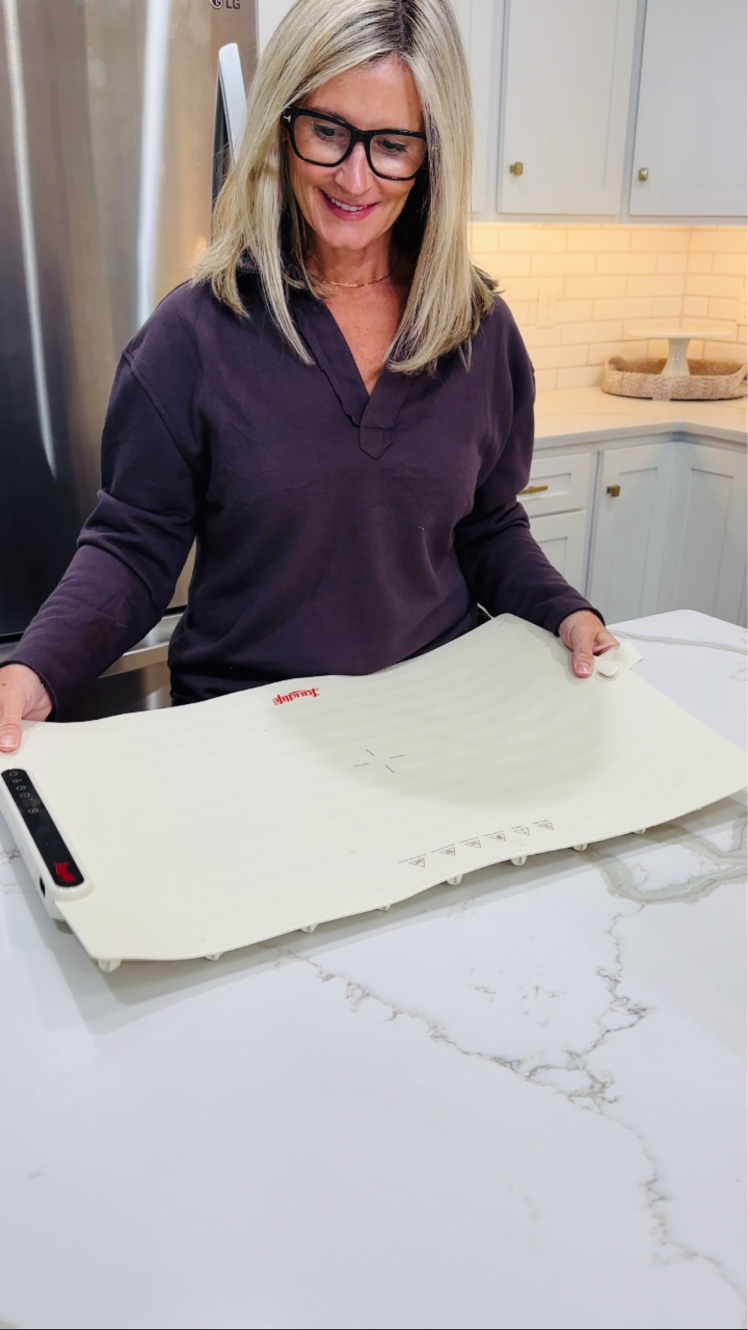 Kitchen gadgets from Amazon that make prepping for the big meal so much easier. A warming mat, digital thermometer, electric can opener and a cordless electric knife  