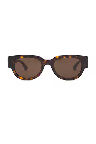 Bottega Veneta Nude Triangle Cat Eye Sunglasses in Havana from Revolve.com | Revolve Clothing (Global)