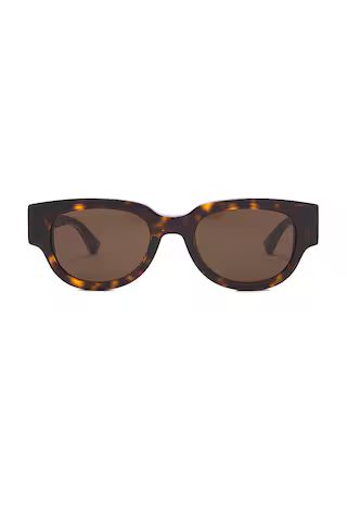 Bottega Veneta Nude Triangle Cat Eye Sunglasses in Havana from Revolve.com | Revolve Clothing (Global)