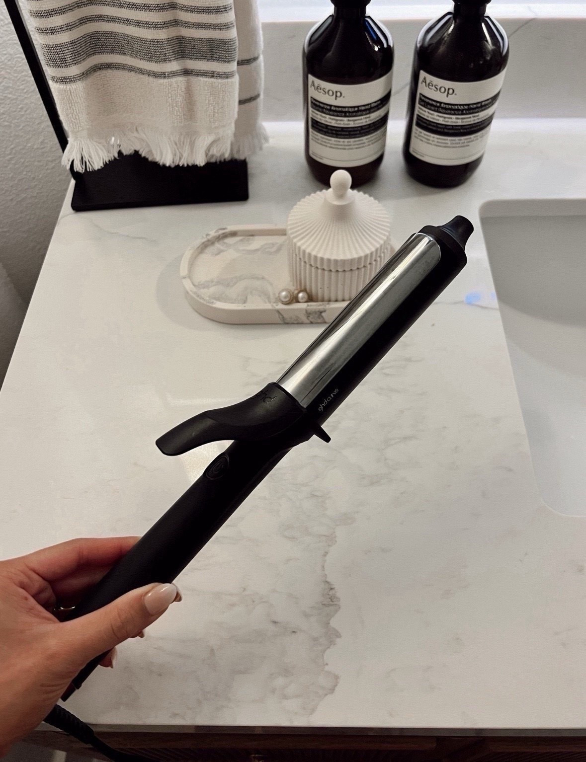 Ghd 1 1/4-inch curling iron that I have been loving lately!  Holds curl and easy to use 

#LTKBeauty