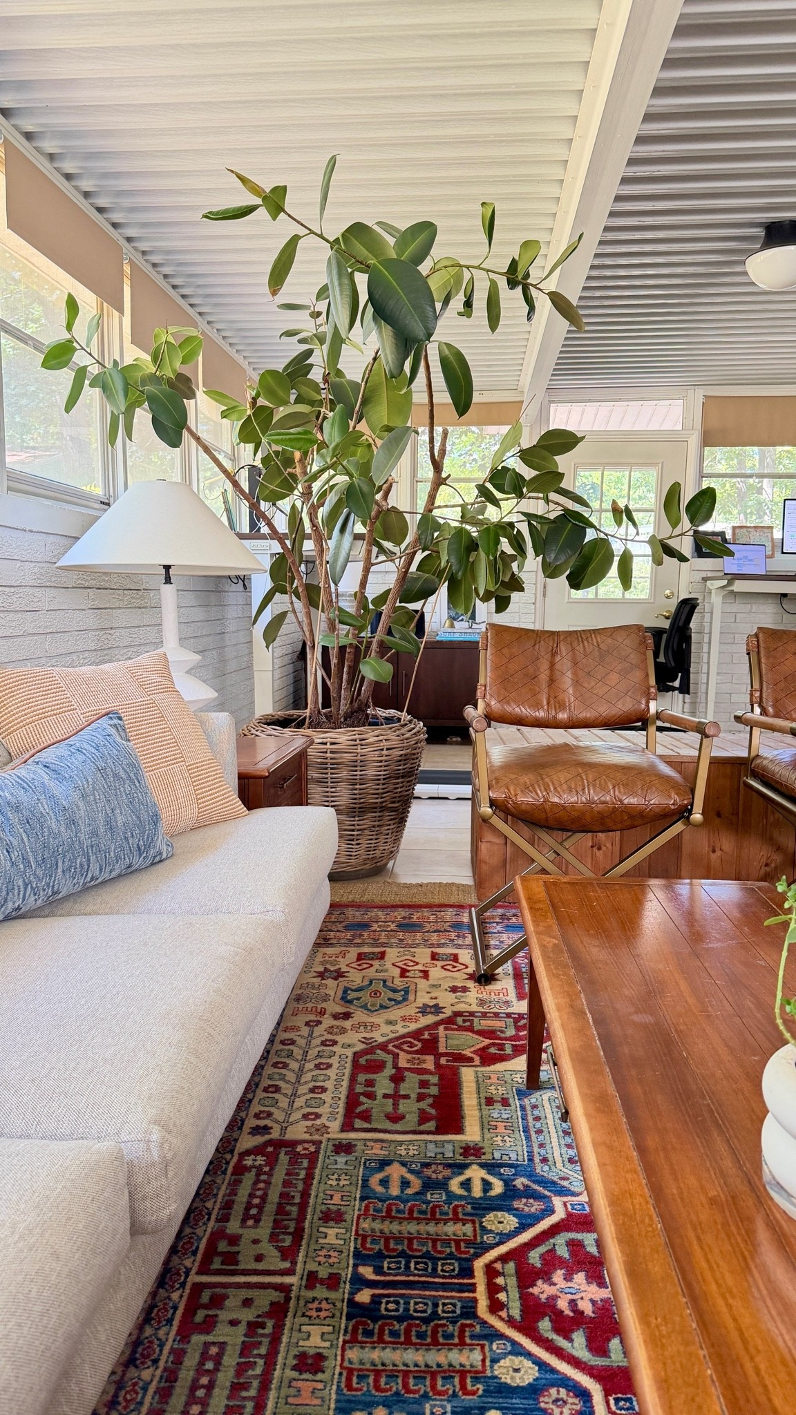The wicker planter is pricey but so good! This is the larger size and it’s big! Brown chairs are vintage and gray couch is old from Article.

#LTKHome