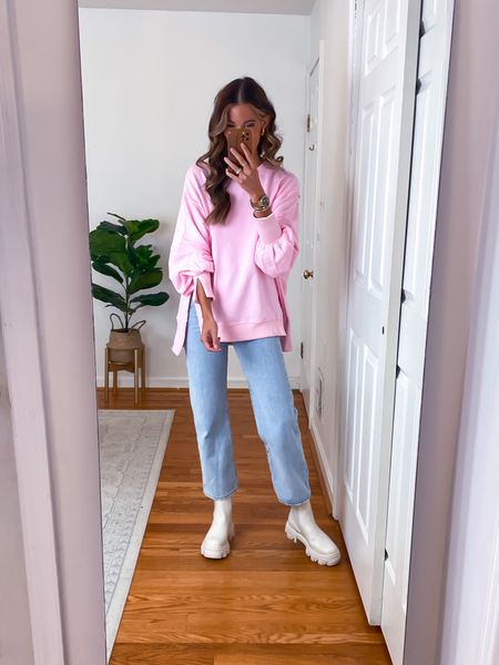 I loved this oversize sweatshirt (wearing a small) so much I bought it in a second color! Goes so well with these neutral lug boots! Jeans fit true to size.

#LTKstyletip #LTKSeasonal