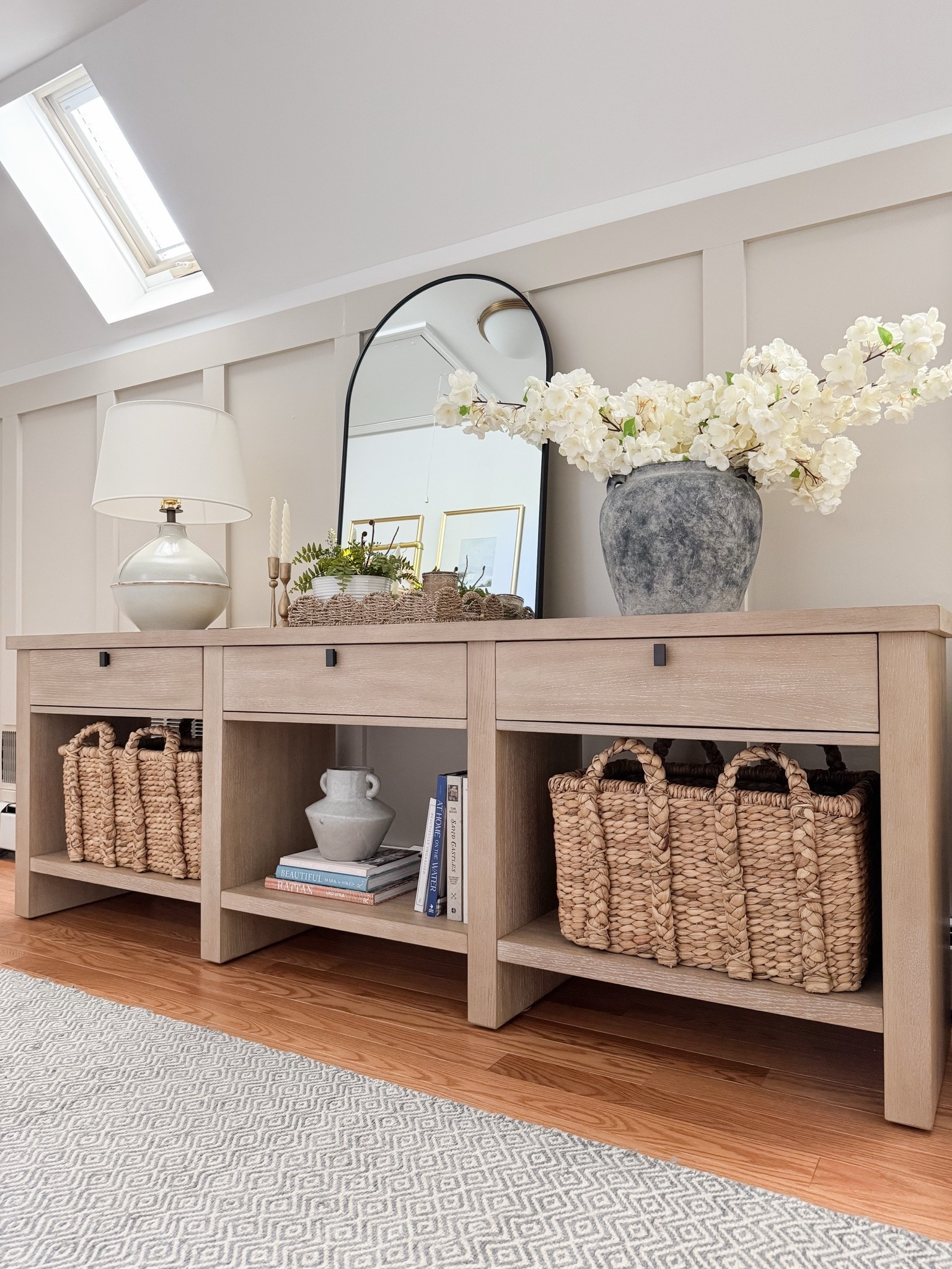 This pottery barn sideboard adds storage and texture while elevating the entire space. coastal storage furniture, sideboard buffet, woven furniture, neutral home decor, coastal interiors, timeless furniture, home organization, living room styling, sherricalnanhome

#LTKHome