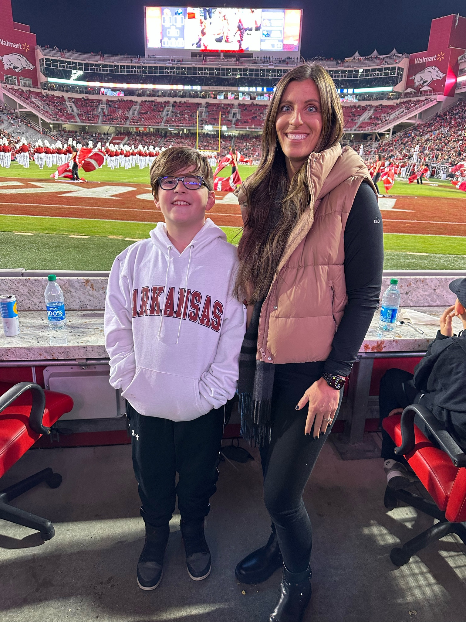 Fall bliss: Winning on and off the field with my little man, cherishing every moment as his love for the Hogs grows with each game. 🍂🏈   Elevating fall fashion with my new obsessions: sleek black rockstud boots, cozy Alo tees, a chic puffer, Burberry scarf, and stylish legging jeans – the perfect ensemble for effortless style on game day  

#LTKfamily #LTKover40 #LTKkids