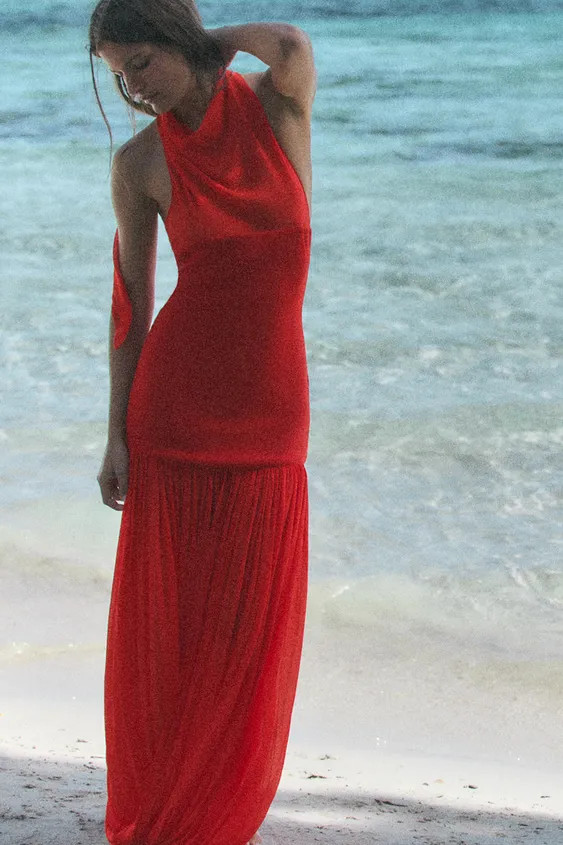 Halter neck dress with a draped neckline. Featuring matching fabric detail and a voluminous hem. ... | Zara UK