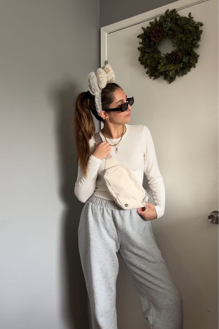 Another fitmas look 🤍

Ribbed long sleeve: Set Active 
Sweatpants: Brandy Melville 
Fanny pack: lululemon 
Shoes: Nikes 
Ears: Disneyland 
Sunglasses: Curl Surf 

Ig: @jkyinthesky & @jillianybarra
TikTok: @jill.ybarra

#disneystyle #casualstyle #neutralstyle #disneyootd #disneyoutfits #disneyoutfit #disneyoutfitinspo #thatdisneygirl #comfystyle #disneyitgirl #disneyaesthetic #winterstyle 

#LTKstyletip #LTKSeasonal #LTKfindsunder50