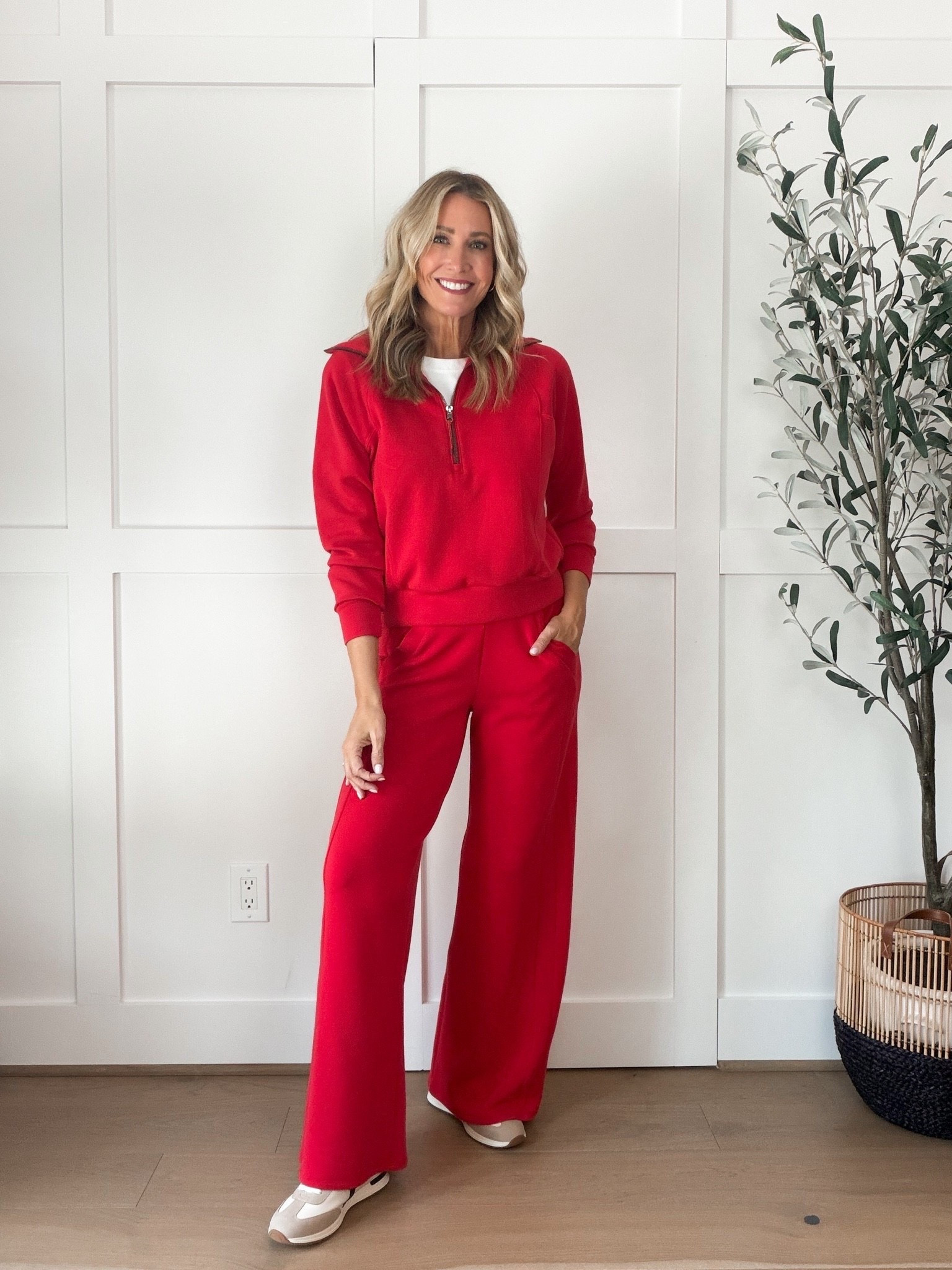 SPANX AirEssentials in red might be my favorite matching set yet! The half zip pullover and wide leg pants are incredibly comfortable for travel days, errands or lounging, and I love the bold color with neutral sneakers.
First time shopping SPANX? Use code HAUTEANDHUMIDXSPANX for 15% off your first order.
SPANX AirEssentials, SPANX matching set, red lounge set, SPANX discount code, wide leg lounge pants, half zip pullover, comfortable travel outfit, airport outfit, matching sets for women, fall athleisure, travel essentials, HauteandHumid