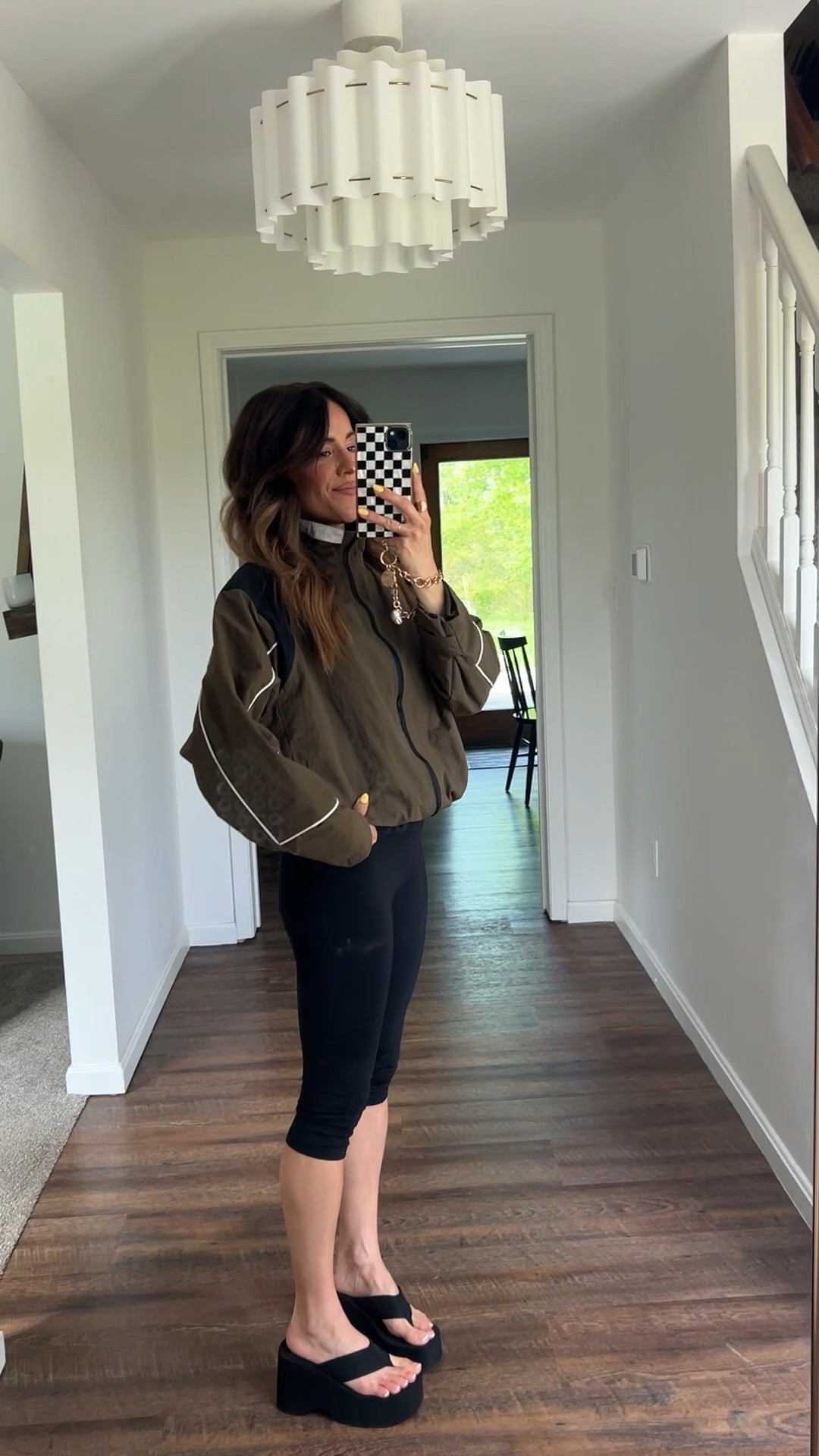 Ootd. Wearing XS in windbreaker. TTS in platform flip flops. TTS XS in capris.

#LTKgrwm #LTKmomlife #LTKootd