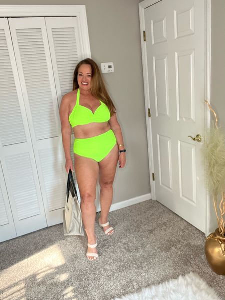 Neon is such an 80s vibe! I love the high waist bottom with ruching! The bikini top features a double strap in the back for great support

#LTKfindsunder50 #LTKmidsize #LTKswim