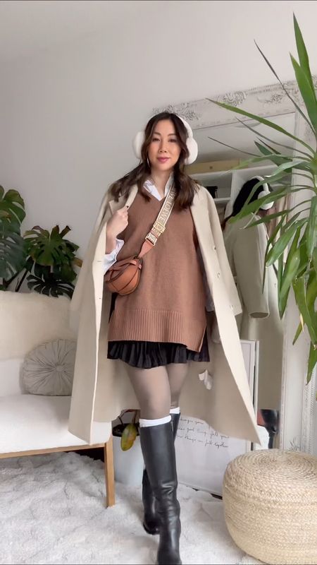 
GRWM: pregnancy outfit at 27 weeks. Styling a cosy and neutral outfit with a sweater vest, skirt and knee-high boots with wool jacket and earmuffs. Jewelry details from @Dean Davidson Jewelry and @Burberry Perfume and boots from @naturalizer. Outfit details below

#LTKworkwear #LTKbump #LTKstyletip