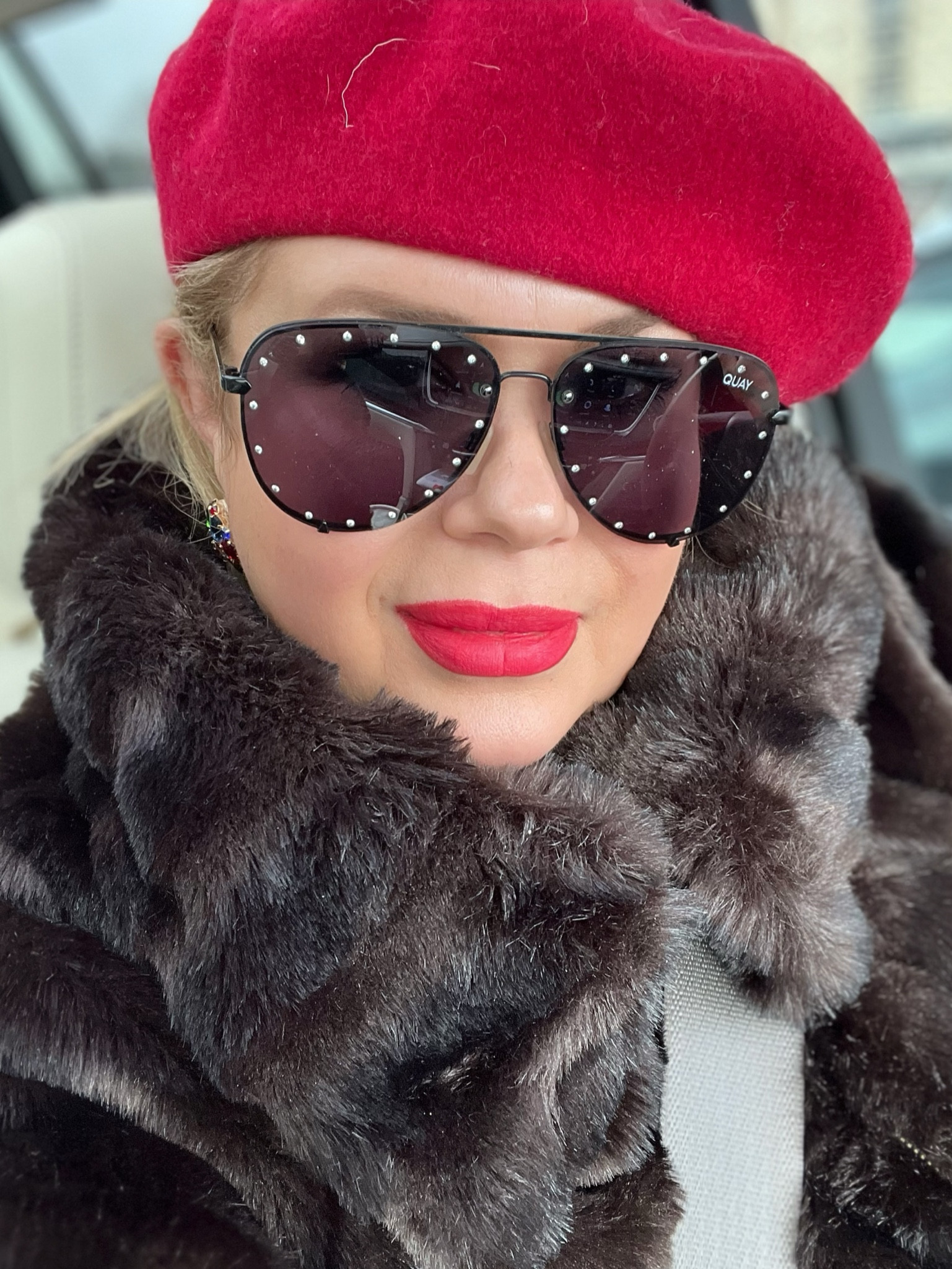 I love me a good pair of shades & a red lip 👄! 

#LTKStyleTip #LTKOver40