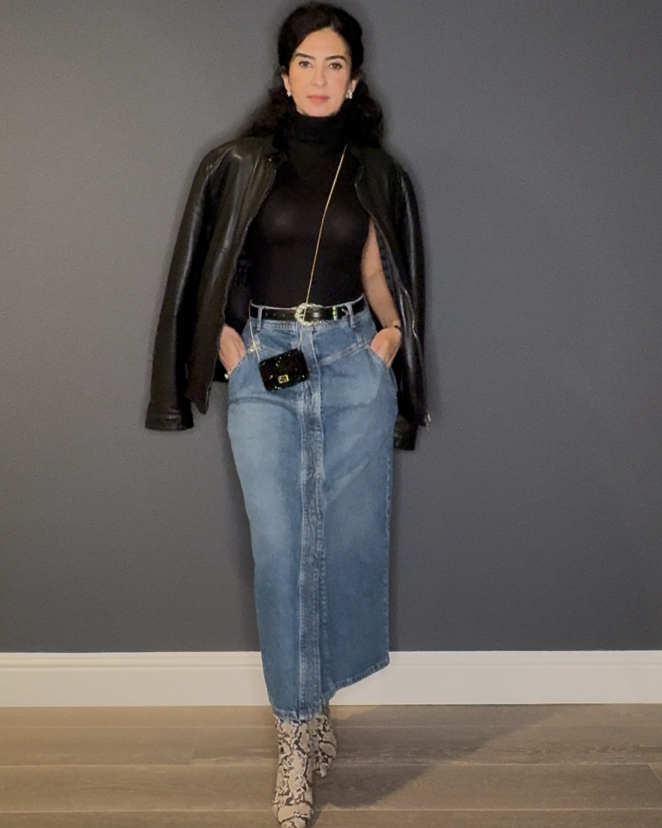 Oversized leather jacket with high boots and a denim skirt. Yasss!! 

#LTKvlog #LTKOver40 #LTKgrwm