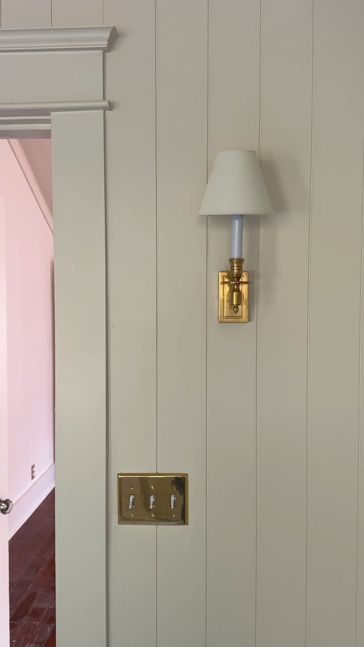 Here is the single library style sconce we sourced for our upstairs guest bathroom. In hand-rubbed antique brass and the shade is in linen. 

#LTKHome #LTKstorytime #LTKmomlife