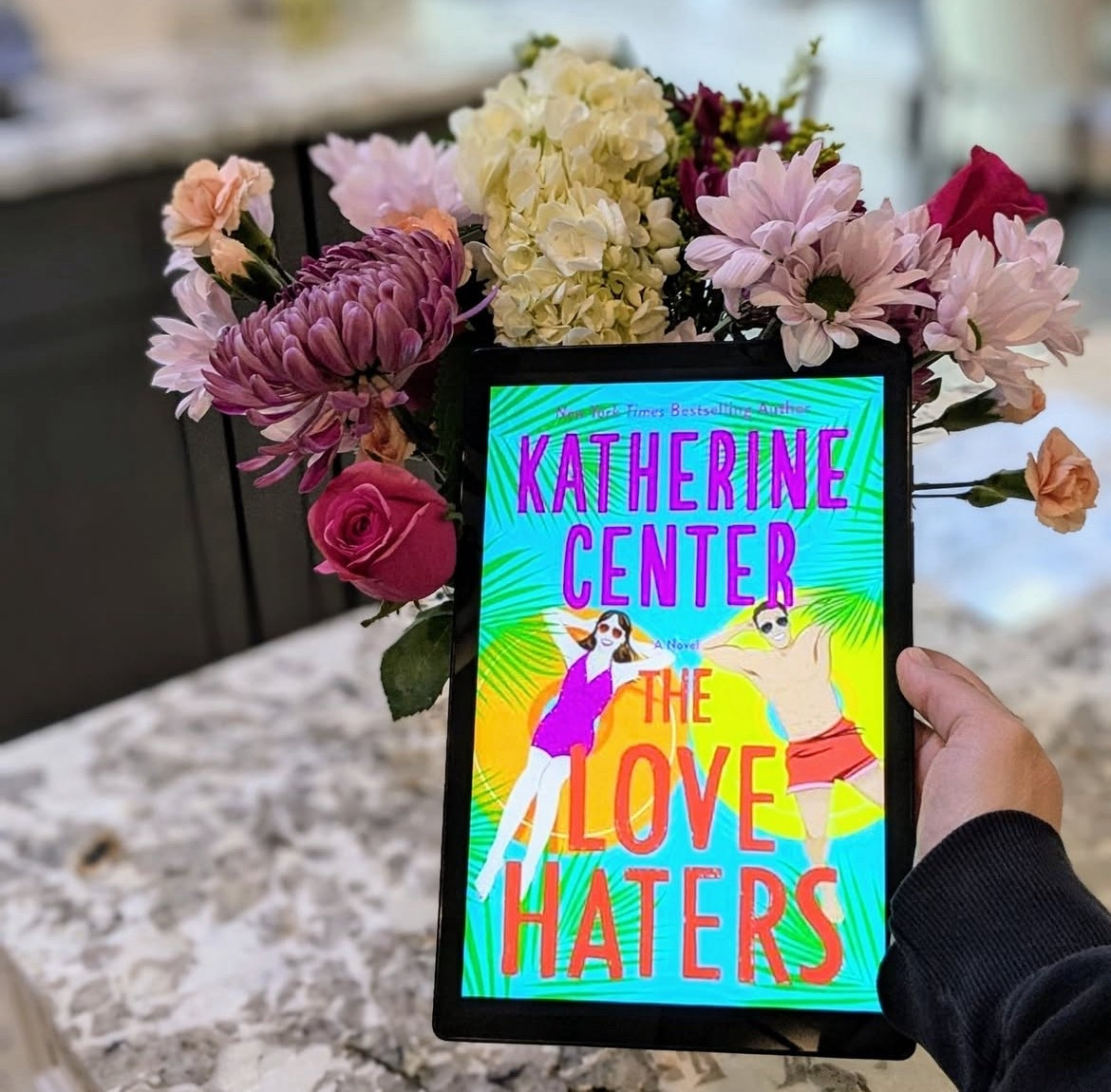 The Love Haters by Katherine Center ⭐⭐⭐💫

Bethany's Review: I love KC's books; they are always a feel-good go-to read for me. This one, unfortunately may have been my least favorite of hers.  The Rom-Commers and The Bodyguard I absolutely loved, I wish this story would have been a bit more like those. Katie Vaughn, takes a job as creating a video profile of “Hutch,” a Coast Guard rescue swimmer in Key West. I did not really feel the chemistry between Katie and “Hutch”. I wanted it. It just was not there. The amount of body image issues Katie expressed throughout the entire story was contrasted with the ”perfect man.” Ugh, there is not a perfect man. Why do women compare themselves to this? I did love Aunt Rue as a side character. She seemed like a lot of fun! The writing was entertaining and I did enjoy reading, I just was not as connected with this one as others that I have read from KC. I did listen to the audiobook and LOVED the narrator.

Sara's Review: This was a quick and easy read. It kept me entertained and I enjoyed the storyline. However, I felt that the romance part of the book was forced. The chemistry and banter were not felt through words, making it hard to connect to their relationship. It felt like Katie, the MC, was looking for perfection in herself, her life and in a relationship, which is incredibly unrealistic. The characters were just blah, which I think is my issue with the book. I just didn't love any of them. There were heavy topics in this book that I think should have been given more seriousness - body image issues, grief, infidelity... They were mentioned often and front and center in the book, but there was no depth to the conversation surrounding them. Overall, the book was fine. It moved quickly, I enjoyed the plot, but I wanted more from all the characters. I am a huge KC fan, so it is very possible that my expectations are unreasonable! If you are looking for a quick summer read, try this, my opinion is not a popular one! 

#LTKFindsUnder50 #LTKSummerEdit #LTKSeasonal