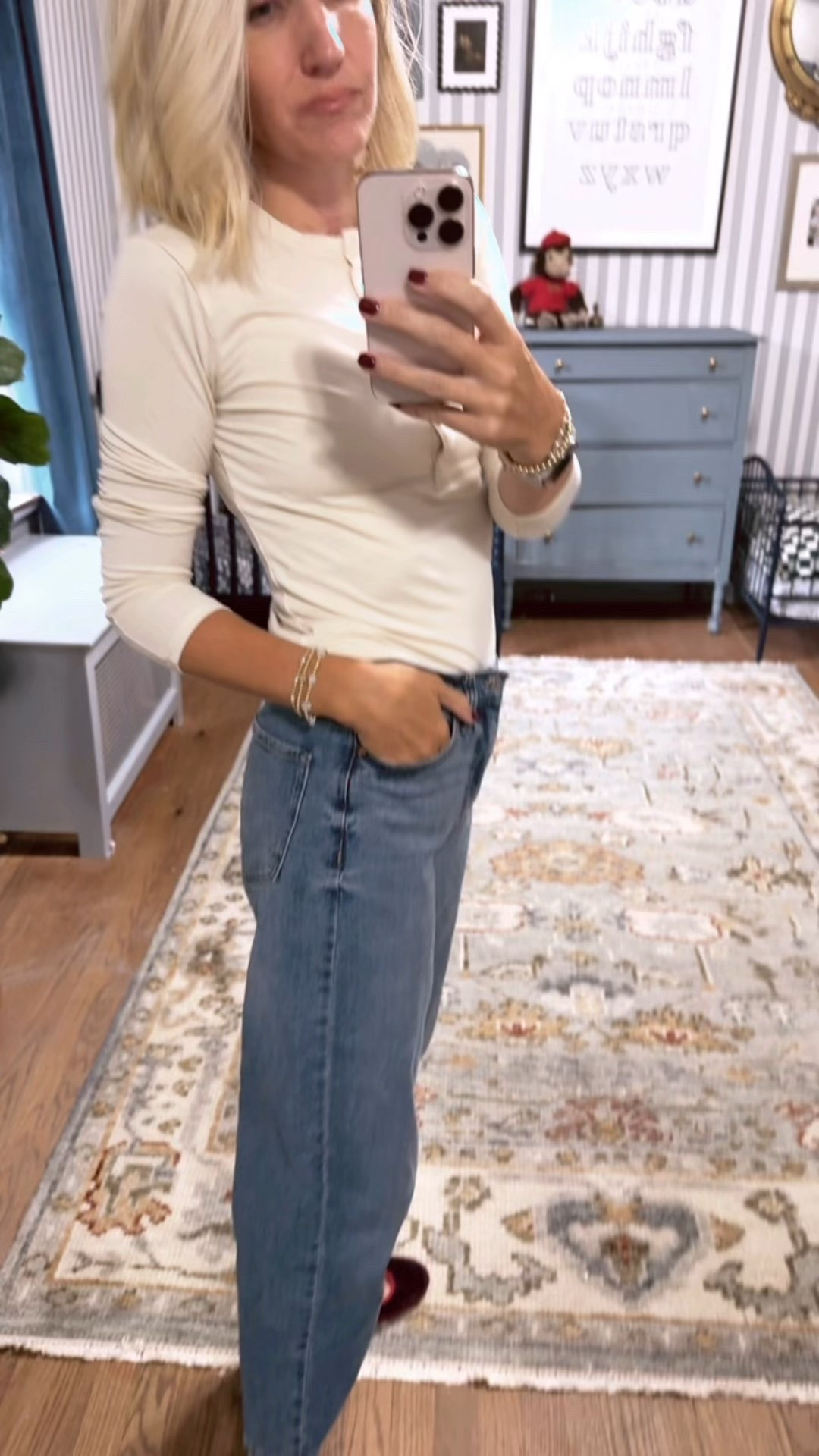 Size medium top. Jeans run tts if not a little big. Don’t size up! 