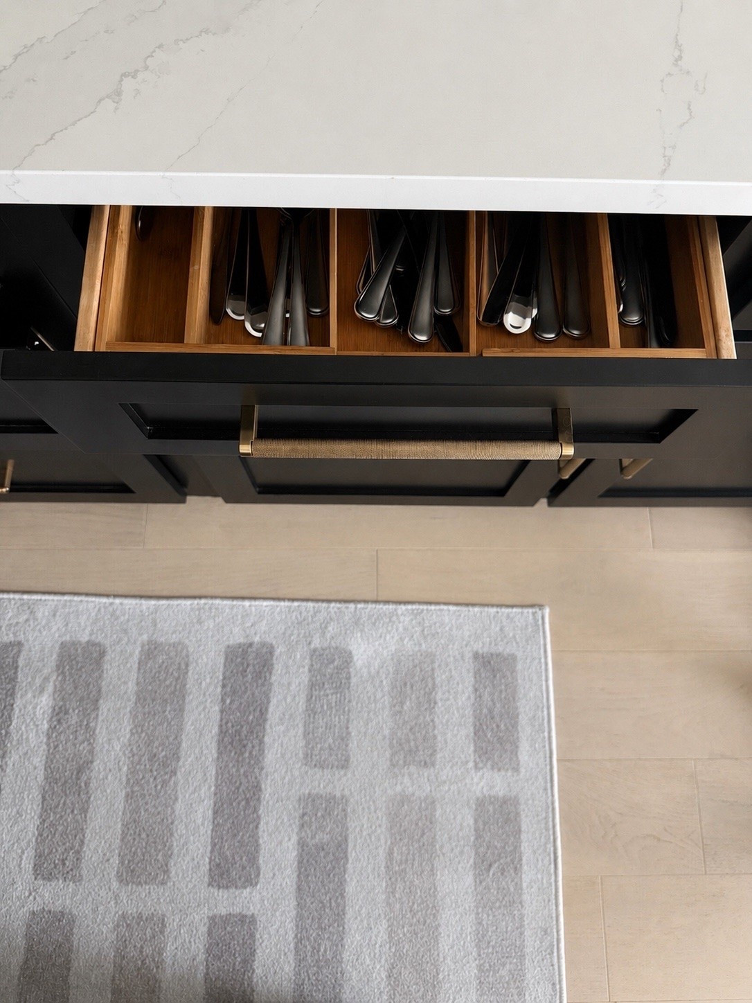 The easiest kitchen upgrade I wish I did sooner ✨ This bamboo drawer organizer instantly makes everyday essentials feel more elevated, organized, and easy to grab.

#LTKHome #LTKKitchen #LTKFinds #KitchenOrganization #DrawerOrganizer #BambooOrganizer #HomeOrganization #ModernKitchen #KitchenEssentials #OrganizedHome

#LTKHome