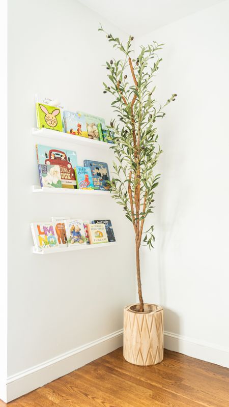 Floating white shelves, bookshelves, artificial olive tree, nursery decor, coastal style home decor

#LTKhome #LTKbaby #LTKfamily
