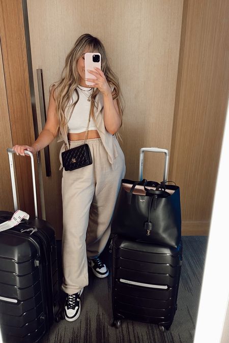Comfy travel outfit - this super affordable sweat suit and crop top combo paired with hightop dunks and chic accessories is perfect for travel!! Amazon outfit - amazon travel outfit 

#LTKunder100 #LTKunder50 #LTKtravel
