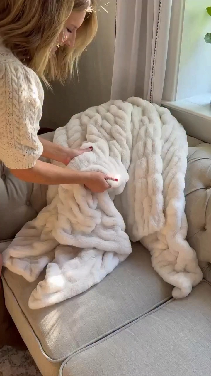 Our girl thrives in the corner of her favorite couch, basking in sunshine! WEEKENDVIBES - hello 50% off LOLA blanket sale right now‼️ Act fast - when they are gone - they are - and they will sell out quick! Use code: LIVINGINYELLOW50 at checkout! 

Why we love her: 
•machine washable
•softest w/great weight 
•make incredible gifts 
•everyone in your house will be hooked, so grab a few😉

Use code: LIVINGINYELLOW50 at checkout to get 50% off while supplies last during their Spring sale!! 

#LTKHome #LTKSaleAlert