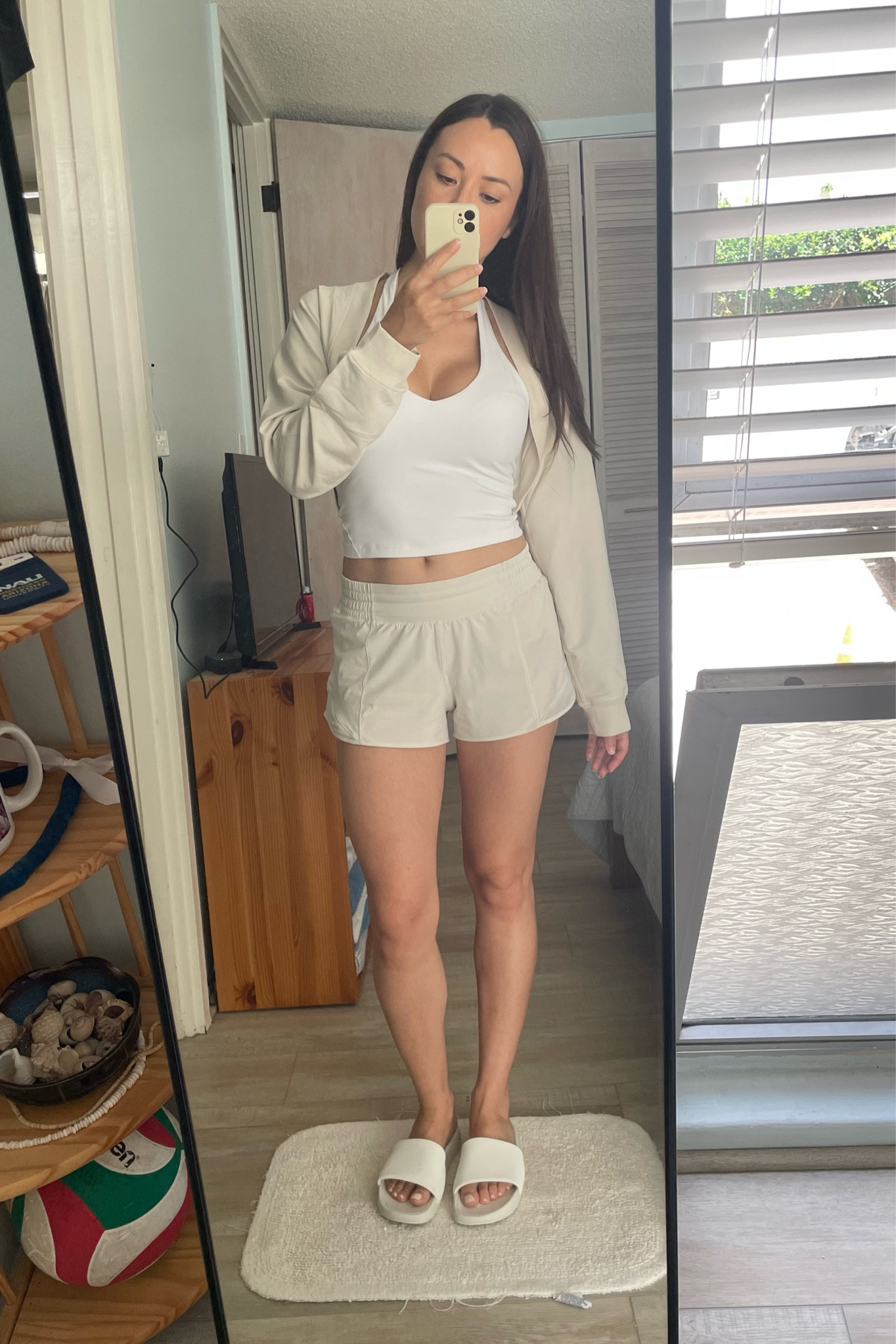 OOTD to run errands on this hot summer day.  I love a good comfy lululemon shorts outfit when I’m out and about.  Threw on this new shrug bc I’m going to the grocery store and it might get cold!

My slider shoes are my fave for summer errands!  
Top and bottom size 6.  

#LTKSeasonal #LTKshoecrush #LTKstyletip