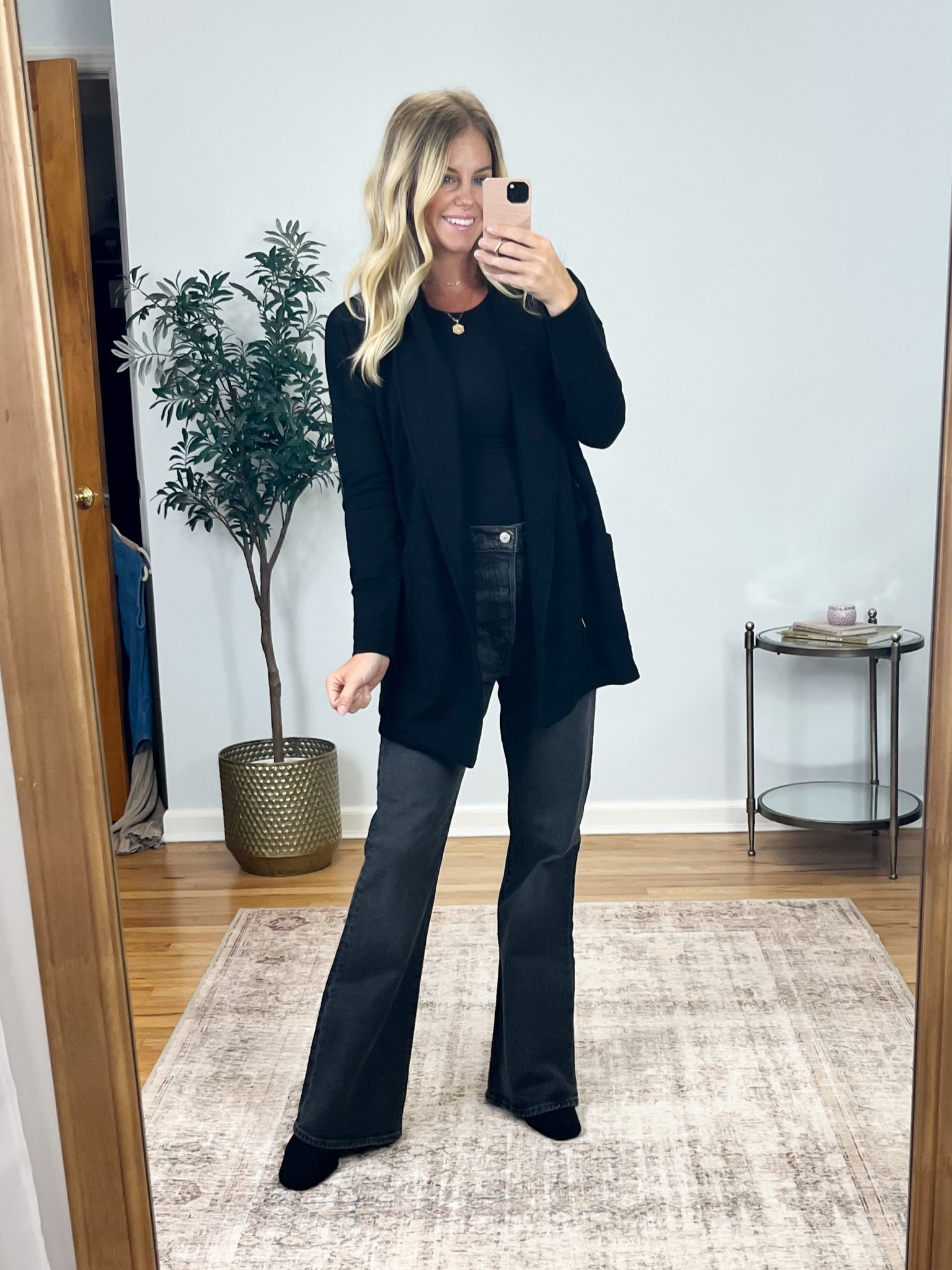 The cutest cardigan jacket, size extra small. Paired with these Levi rib cage flares and a bodysuit. Loving the monochromatic look! 
.

#LTKworkwear #LTKstyletip #LTKunder50
